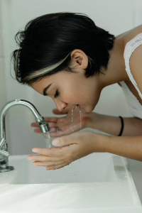 girl washing face